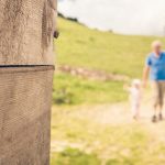 Grandpa and granddaughter hike